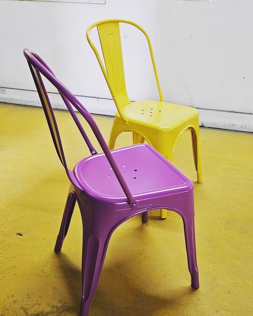 Yellow and purple metal chairs
